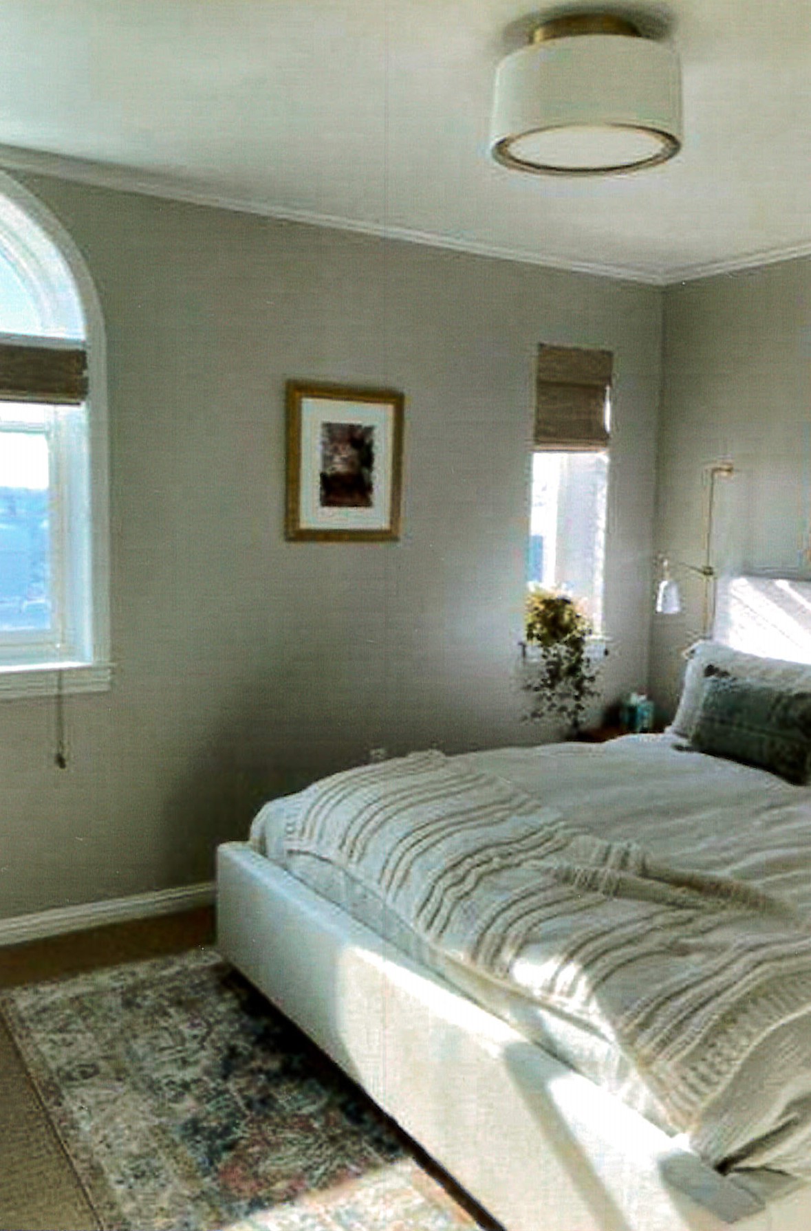Renovated sixth floor unit living space, restored window 